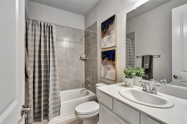 bathroom with vanity, toilet, and shower / tub combo