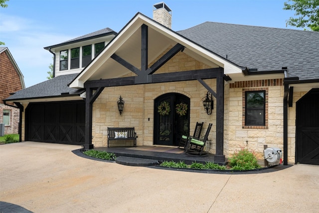 115 Saint Annes Dr, Mabank, TX 75156 - view of front of house with stone siding, roof with shingles, a chimney, and concrete driveway