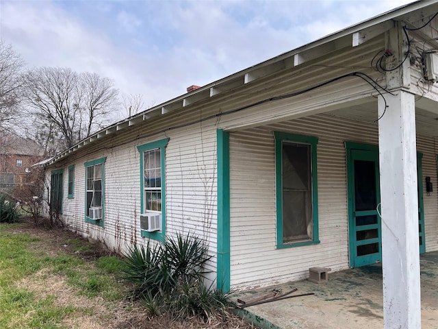 view of property exterior with cooling unit