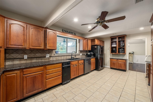 kitchen featuring a ceiling fan, freestanding refrigerator, light tile patterned floors, a sink, and dishwasher