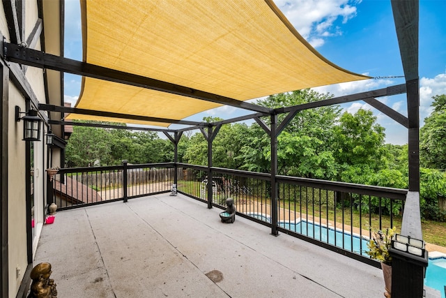 view of patio / terrace with an outdoor pool
