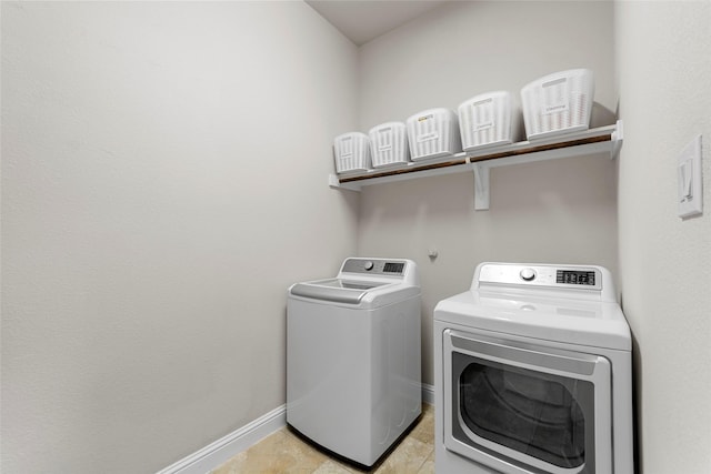 3608 Delta Dr, Mckinney, TX 75071 - washroom featuring washing machine and clothes dryer, baseboards, and light tile patterned floors