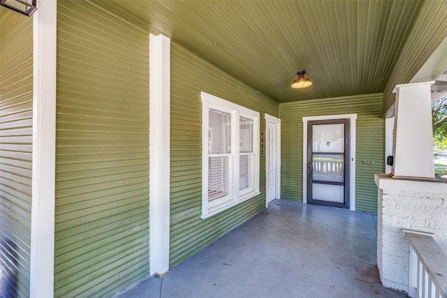 entrance to property with a porch
