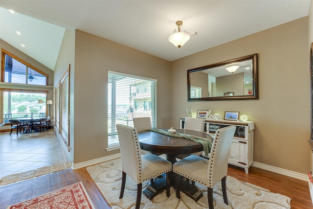 5553 Lakeshore Ct, Log Cabin, TX 75148 - dining space featuring baseboards, wood finished floors, and a healthy amount of sunlight