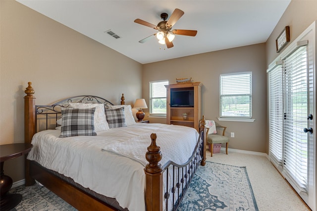 5553 Lakeshore Ct, Log Cabin, TX 75148 - bedroom with baseboards, visible vents, multiple windows, and light carpet