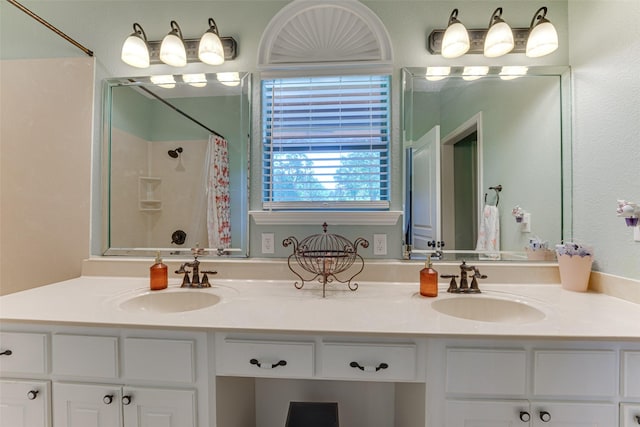 5553 Lakeshore Ct, Log Cabin, TX 75148 - full bathroom with double vanity, a sink, and curtained shower