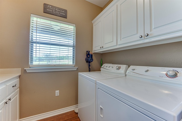 5553 Lakeshore Ct, Log Cabin, TX 75148 - washroom featuring washing machine and clothes dryer, baseboards, wood finished floors, and cabinet space