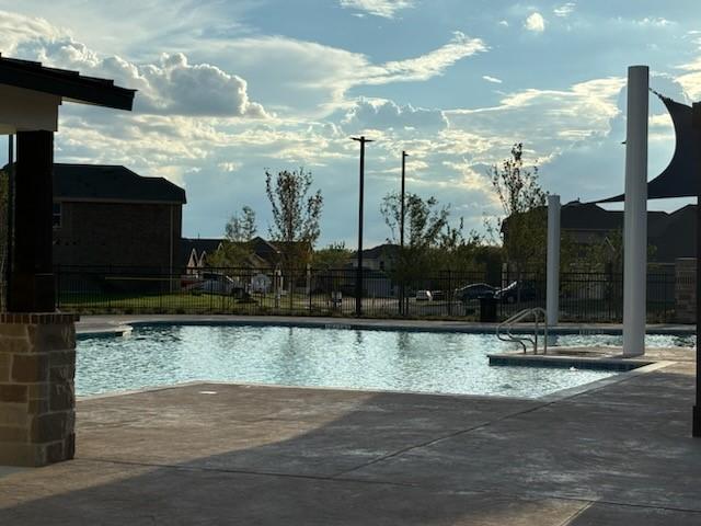 1109 Colonial Bluff Ln, Princeton, TX 75407 - pool featuring a patio and fence