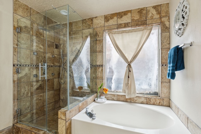 full bath with a garden tub and a stall shower