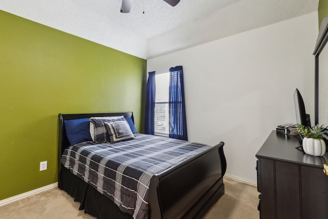 106 Hollywood Blvd, Euless, TX 76040 - bedroom featuring carpet floors, baseboards, a ceiling fan, and a textured ceiling