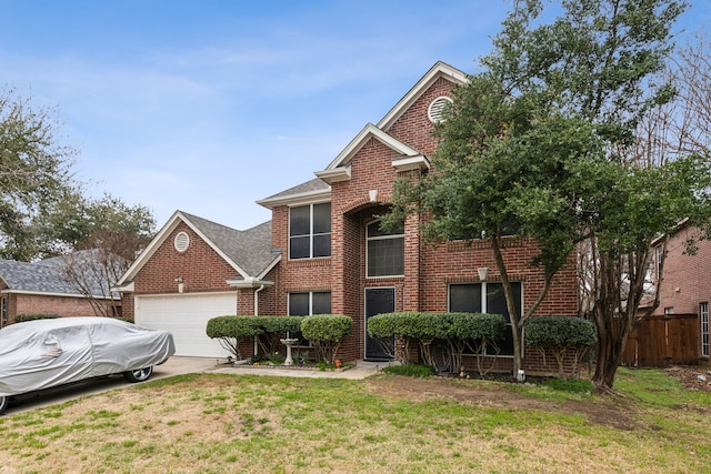 traditional-style home featuring a garage, a front lawn, fence, roof with shingles, and brick siding