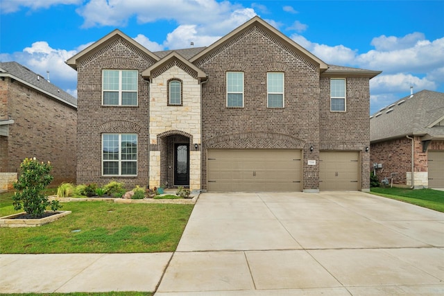 7210 Rustic Rock Rd, Arlington, TX 76001 - view of front facade featuring an attached garage, a front lawn, stone siding, brick siding, and concrete driveway
