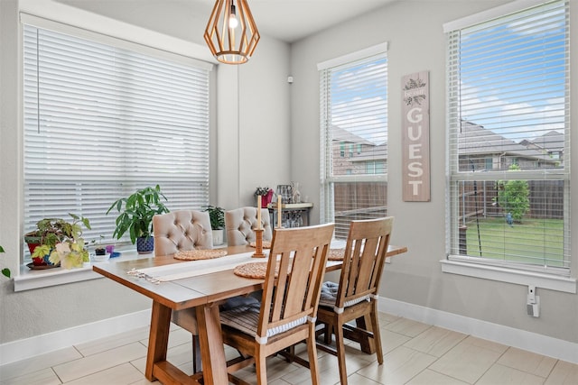 7210 Rustic Rock Rd, Arlington, TX 76001 - dining area featuring baseboards and breakfast area