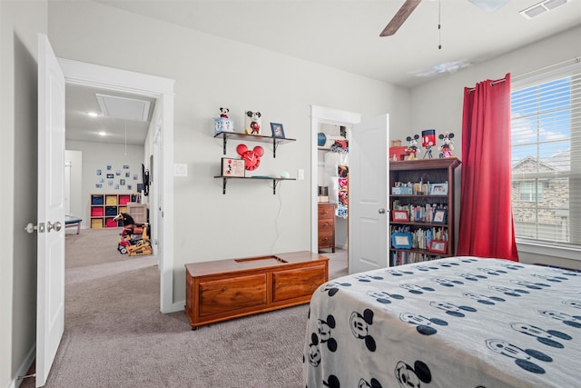 7210 Rustic Rock Rd, Arlington, TX 76001 - carpeted bedroom with ceiling fan, visible vents, a spacious closet, and attic access