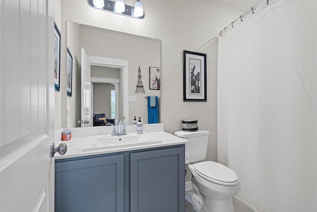 7210 Rustic Rock Rd, Arlington, TX 76001 - full bathroom with toilet and vanity