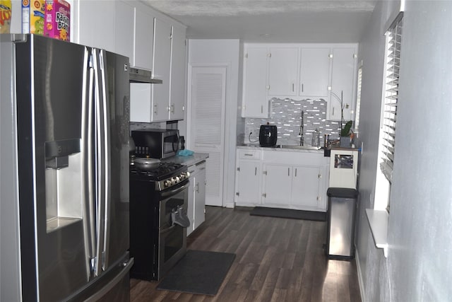 372 Shoreline Dr, Azle, TX 76020 - kitchen with double oven range, a sink, stainless steel microwave, refrigerator with ice dispenser, and under cabinet range hood