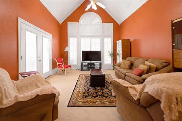 1204 Lakeridge Dr, Ennis, TX 75119 - living room with carpet floors, ceiling fan, ornamental molding, and lofted ceiling