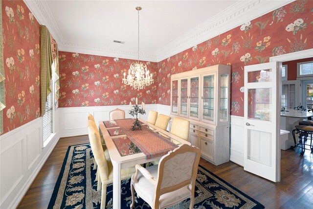 1204 Lakeridge Dr, Ennis, TX 75119 - dining space featuring a wainscoted wall, plenty of natural light, a notable chandelier, and visible vents