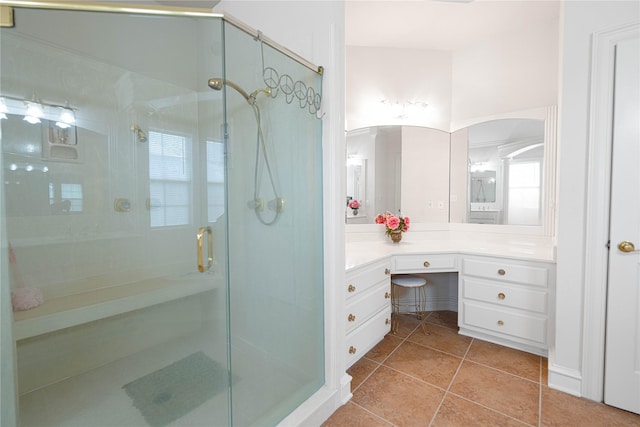 1204 Lakeridge Dr, Ennis, TX 75119 - full bathroom with vanity, tile patterned flooring, and a stall shower