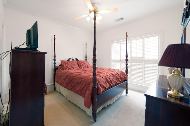 1204 Lakeridge Dr, Ennis, TX 75119 - bedroom featuring crown molding, ceiling fan, visible vents, and light carpet