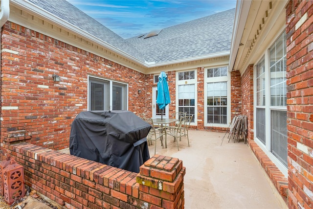 1204 Lakeridge Dr, Ennis, TX 75119 - view of patio with outdoor dining area and area for grilling
