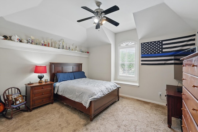 bedroom featuring baseboards, a ceiling fan, lofted ceiling, and light carpet