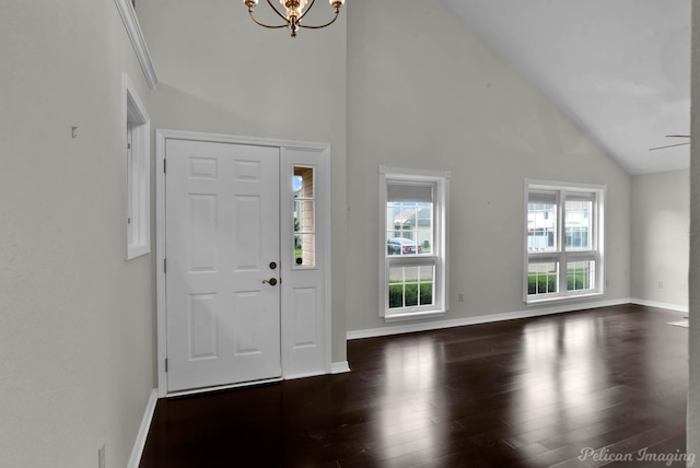 9518 Hackberry Dr, Shreveport, LA 71115 - foyer entrance with baseboards, wood finished floors, and a notable chandelier