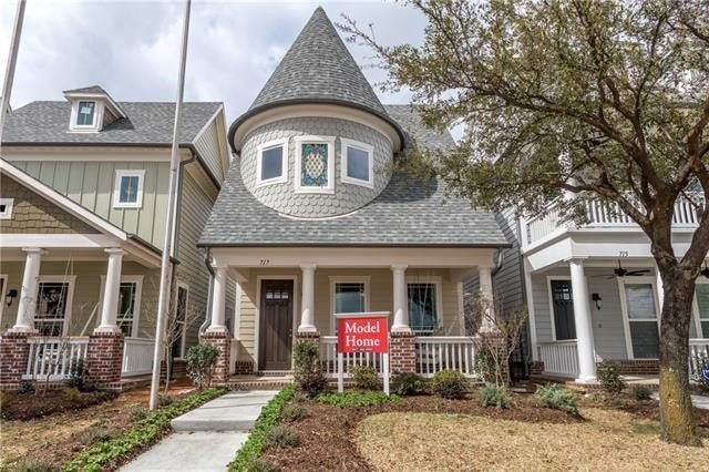 603 E Midway, Euless, TX 76039 - view of front of property with board and batten siding, a shingled roof, and a porch