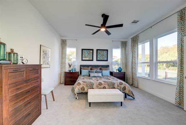 603 E Midway, Euless, TX 76039 - bedroom with light colored carpet, ceiling fan, and visible vents