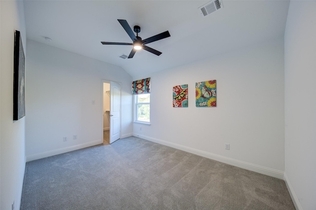 603 E Midway, Euless, TX 76039 - unfurnished bedroom with baseboards, carpet, vaulted ceiling, and visible vents