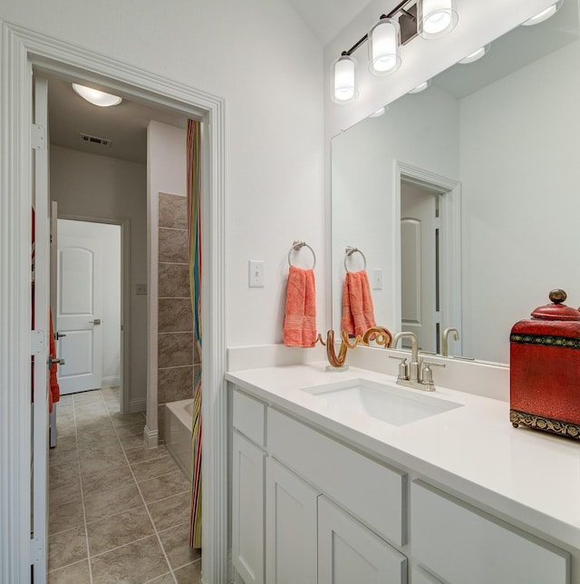 603 E Midway, Euless, TX 76039 - full bath featuring vanity, shower / tub combo with curtain, tile patterned flooring, and visible vents
