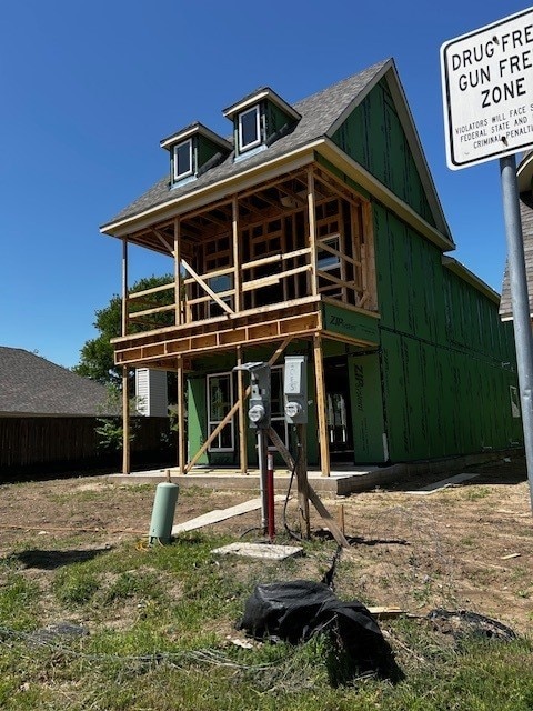 603 E Midway, Euless, TX 76039 - rear view of house featuring board and batten siding and a deck