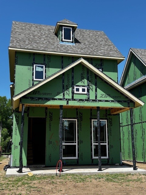 603 E Midway, Euless, TX 76039 - property under construction with roof with shingles