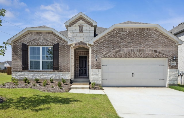 1616 Cottonwood Valley Dr, Celina, TX 75009 - french country inspired facade with an attached garage, driveway, brick siding, a front yard, and stone siding