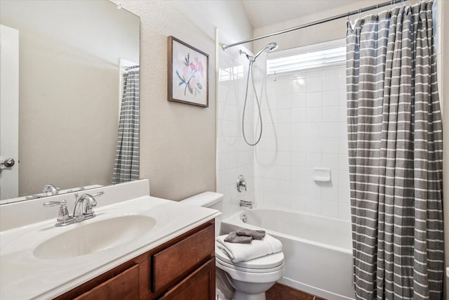 full bathroom with vanity, shower / bathtub combination with curtain, and toilet