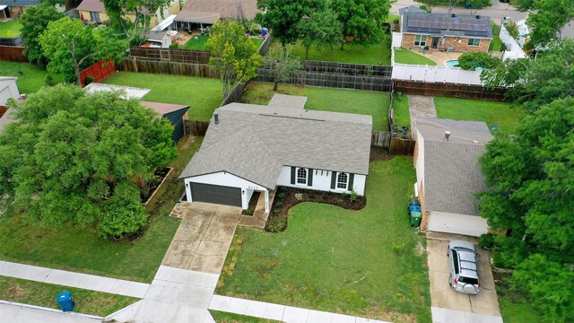 birds eye view of property with a residential view