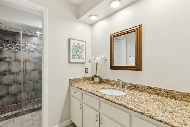 16114 Shadybank Dr, Dallas, TX 75248 - bathroom with vanity, baseboards, and a shower stall
