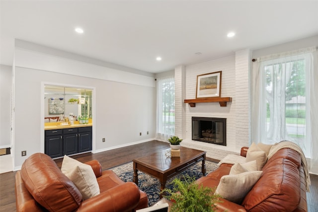 16114 Shadybank Dr, Dallas, TX 75248 - living room with recessed lighting, baseboards, dark wood finished floors, and a fireplace