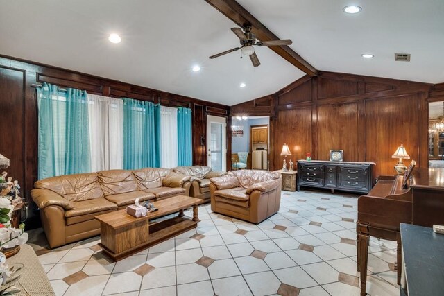 living area featuring visible vents, light tile patterned flooring, wooden walls, vaulted ceiling with beams, and a ceiling fan