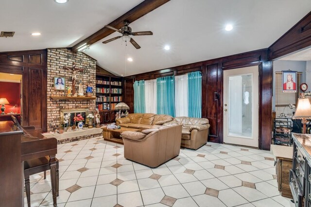 living area with vaulted ceiling with beams, ceiling fan, light tile patterned floors, and visible vents