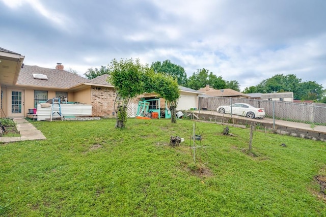 view of yard with fence