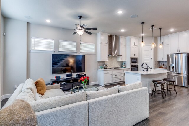 8210 Laflin Ln, Dallas, TX 75231 - living room featuring a ceiling fan, dark wood-style flooring, and recessed lighting