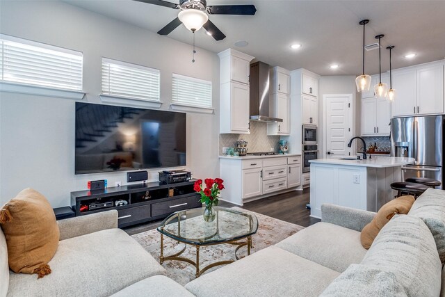 8210 Laflin Ln, Dallas, TX 75231 - living room with dark wood-style flooring, stairway, a ceiling fan, baseboards, and recessed lighting