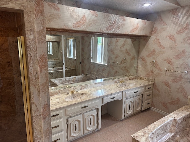 full bath featuring tile patterned flooring, baseboards, vanity, and wallpapered walls