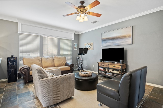 living area featuring ceiling fan, visible vents, baseboards, ornamental molding, and stone tile floors