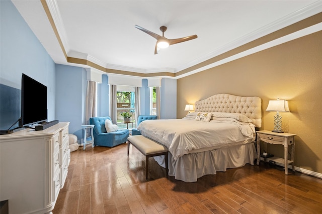 bedroom with baseboards, ornamental molding, wood-type flooring, and ceiling fan
