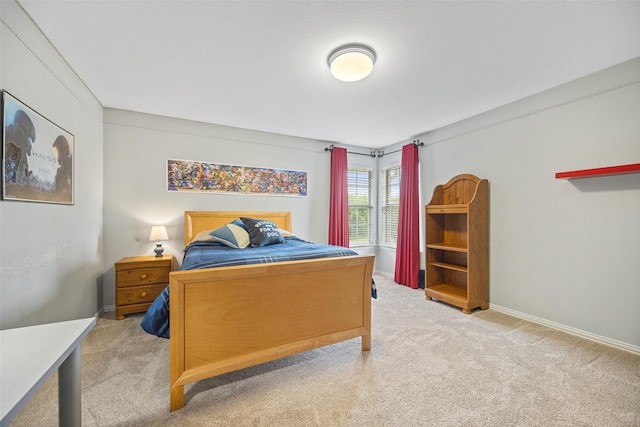 bedroom featuring carpet flooring