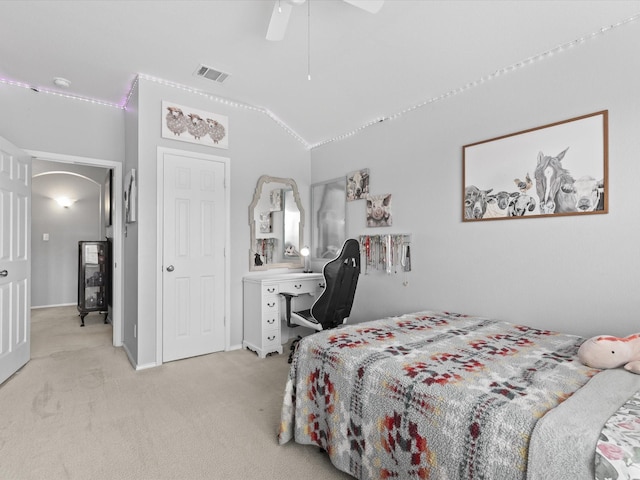 1646 Country Hls, Waxahachie, TX 75165 - bedroom featuring a ceiling fan, visible vents, arched walkways, lofted ceiling, and light carpet