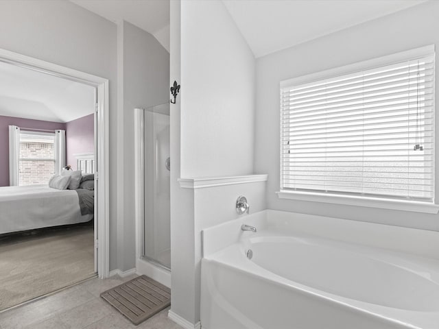 1646 Country Hls, Waxahachie, TX 75165 - ensuite bathroom featuring a garden tub, connected bathroom, vaulted ceiling, and a shower stall