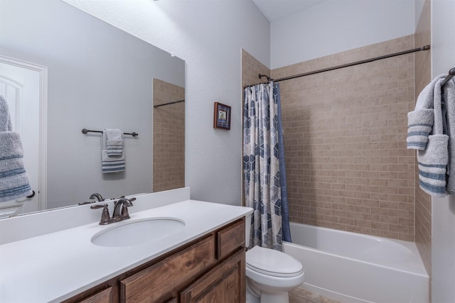 full bath with vanity, shower / bath combo with shower curtain, and toilet